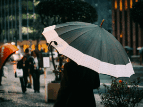 Shoppers in the rain